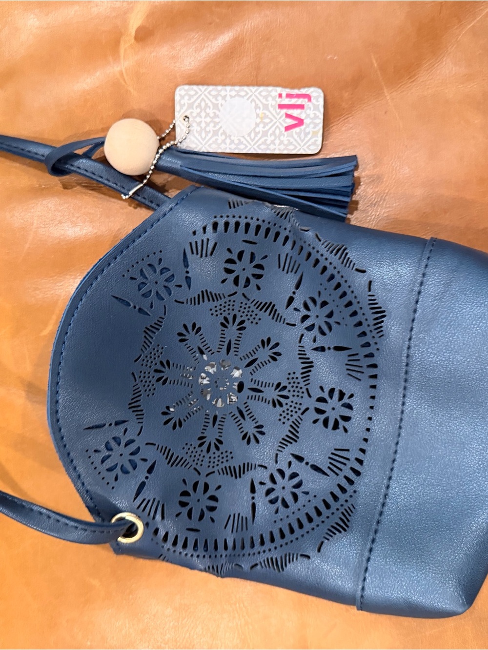 Valija Gitana Blue Laser-Cut Floral Crossbody Bag
